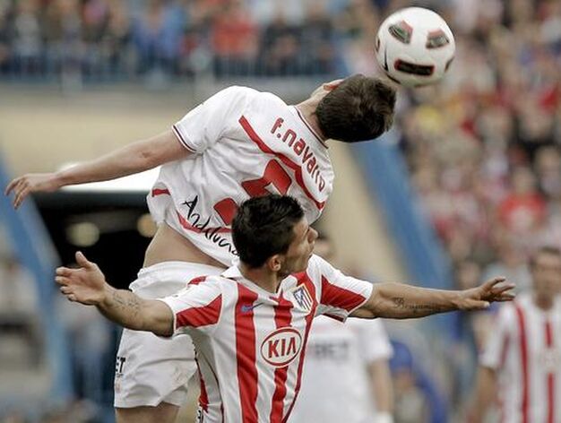 El Sevilla se trae un punto del Vicente Calder&oacute;n tras empatar con el Atl&eacute;tico de Madrid (2-2). / EFE