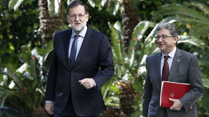 Mariano Rajoy  y el delegado del Gobierno en Cataluña , Enric Millo, durante un acto de Barcelona.