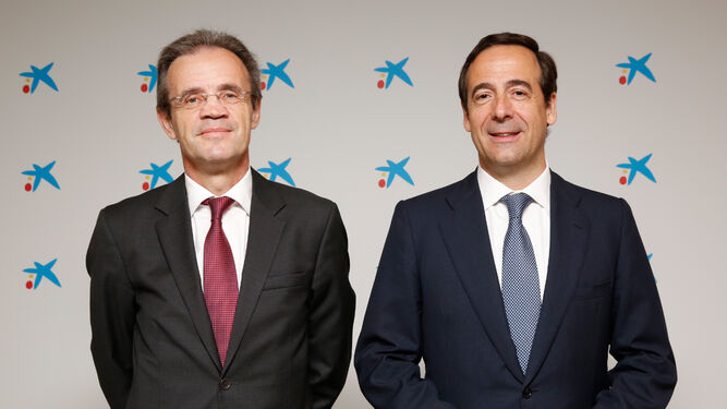 Jordi Gual y Gonzalo Gortázar, presidente y consejero delegado de Caixabank.