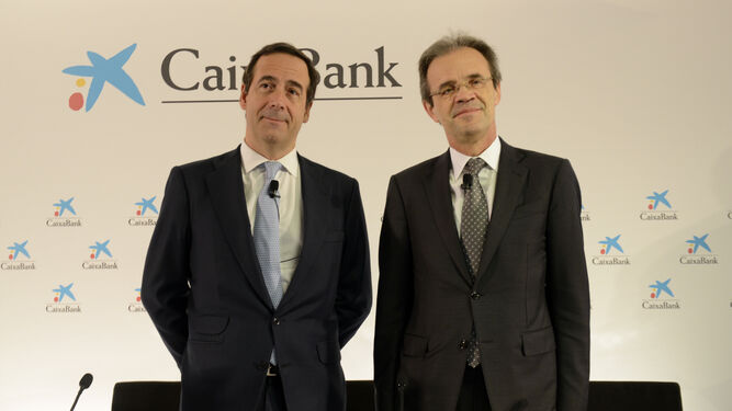 El consejero delegado  de Caixabank, Gonzalo Gortázar y el presidente, Jordi Gual.