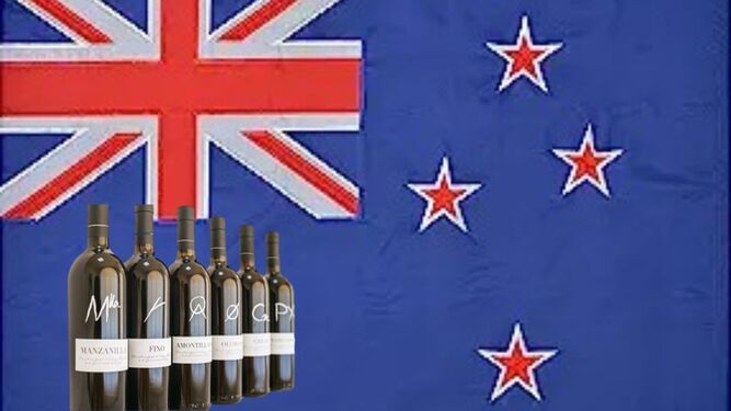 Botellas de vinos de Jerez con la bandera de Nueva Zelanda al fondo.